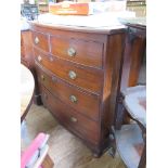 A mid 19th century mahogany bowfront chest of drawers, with two short and three long graduated