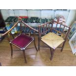 A late Victorian stained beech corner chair, with central roundel and outsplayed legs, and a