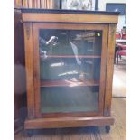 A Victorian walnut and inlaid display cabinet, with gilt-metal mounts, single glazed door and