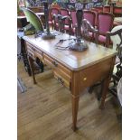 An Edwardian mahogany lady's writing desk, the inset top over four drawers around a kneehole on
