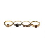 A 9 carat gold paste set ring, a gold and silver ring and two paste rings