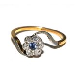 A diamond and posy ring set in 18 carat gold