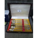 A boxed set of ten 800 silver iced tea/ cocktail swizzle spoons