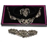 A cased collection of marcasite to include necklace, bracelet and brooch