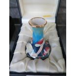 A Moorcroft enamel Toadstool design vase, initialled R.D.R., 8cm high, with presentation box