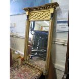 A Regency giltwood wall mirror, the ball applied cornice over a lattice frieze and rectangular plate
