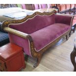 An early 19th century Dutch inlaid sofa, depicting butterflies and parrots among floral swags,