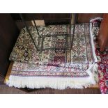 *A Keshan rug, with central medallion and foliate filled beige field, within a multiple border,