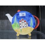 A Clarice Cliff inspired Past Times Art Deco style tea pot with landscape decorations