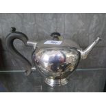 A silver bullet form teapot by Mappin & Webb, London 1919, 14cm high