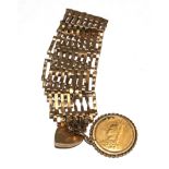 A 9 carat gold gate bracelet with a Victorian sovereign 1892