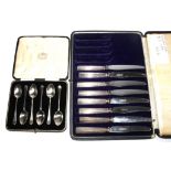 A cased set of six silver coffee spoons together with a cased set of eight tea knives, four missing