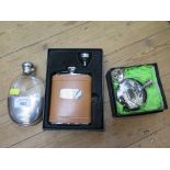 A glass hip flask with plated top and detachable cup base by Walker & Hall together with two