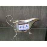 A small silver cream jug on three hoof feet