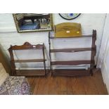 A mahogany hanging wall shelf, with four serpentine tiers on shaped supports, 68cm wide, 77cm high