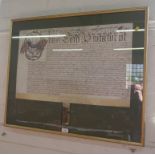 A 17th century vellum legal manuscript dated Feb 1656, framed, lacks seal 42cm x 66cm