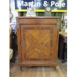 A French style inlaid kingwood pier cabinet, with red marble top over a parquetry frieze drawer