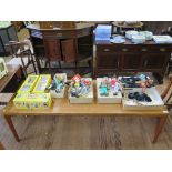 A Danish teak coffee table, the rectangular top on moulded tapering legs, stamped Vejle, Stole