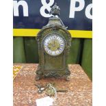 A 19th century French green boullework table clock with all over scroll design, giltmetal dial