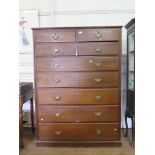 An Edwardian tall chest of drawers, with two short and six long drawers on a plinth base, 120cm