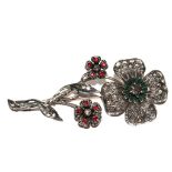 A large brooch in the form of three flowers, the brooch is set with fifty-four rose diamonds and ten