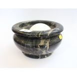 A black marble circular bowl 20cm diameter and a white marble ball 9cm diameter