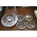 A set of four glass and silver plate coasters together with a Waterford glass dish
