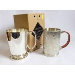 A Royal Selanger pewter tankard with fine detail and a wooded handle and original box, together with