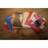 A collection of 45 rpm single records, including A Hard Day's Night by The Beatles (R5160), Little