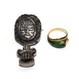 An 18 carat gold and green enamel snake ring and a Folli Follie brooch