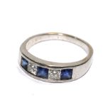 An 18 carat white gold five stone ring set with square sapphires and round diamonds