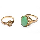 A cabochon jade ring together with a 15 carat gold citrine ring