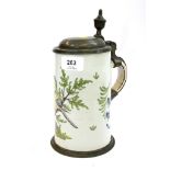 An early 19th century German faience stoneware stein, depicting a yellow bird on a branch, the