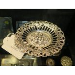 A small cast oval pin tray with floral and other decorations, 925 silver