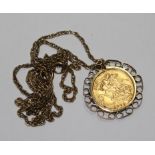 A half Sovereign, Edward VII 1909, in gold mount suspended from 9 carat chain