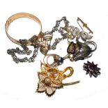 A small bag of costume jewellery, to include three rings