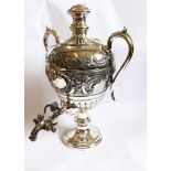 A silver plated urn and cover