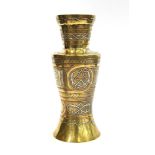 A Mamluk Revival Cairoware silver and copper inlay brass vase, base with indelible ink numerals