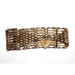 A 9 carat gold large gate bracelet