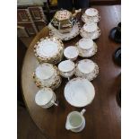 An Edwardian Bradley's China underglaze blue and red tea service, and an associated teapot (39