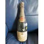 A bottle of Louis Roederer Champagne, labels perished, possibly 1970s