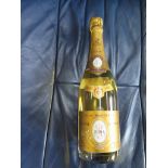 A bottle of Louis Roederer Cristal Champagne, Brut, 2004