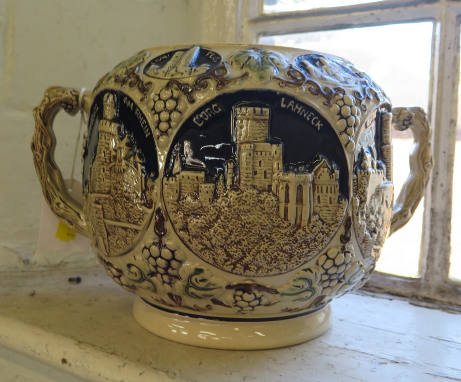 A large two handled German stoneware vintage bowl depicting various German landmarks and castles