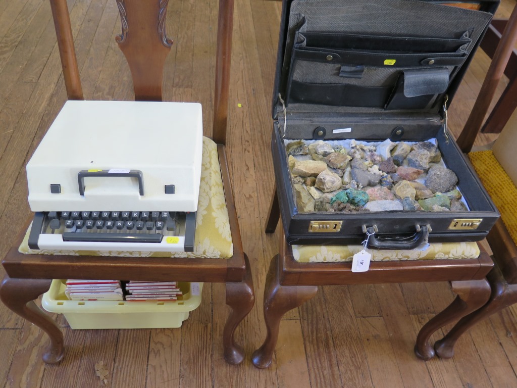 Forty-six Ordnance Survey maps, an Olympia Traveller De Luxe typewriter, and a case of minerals
