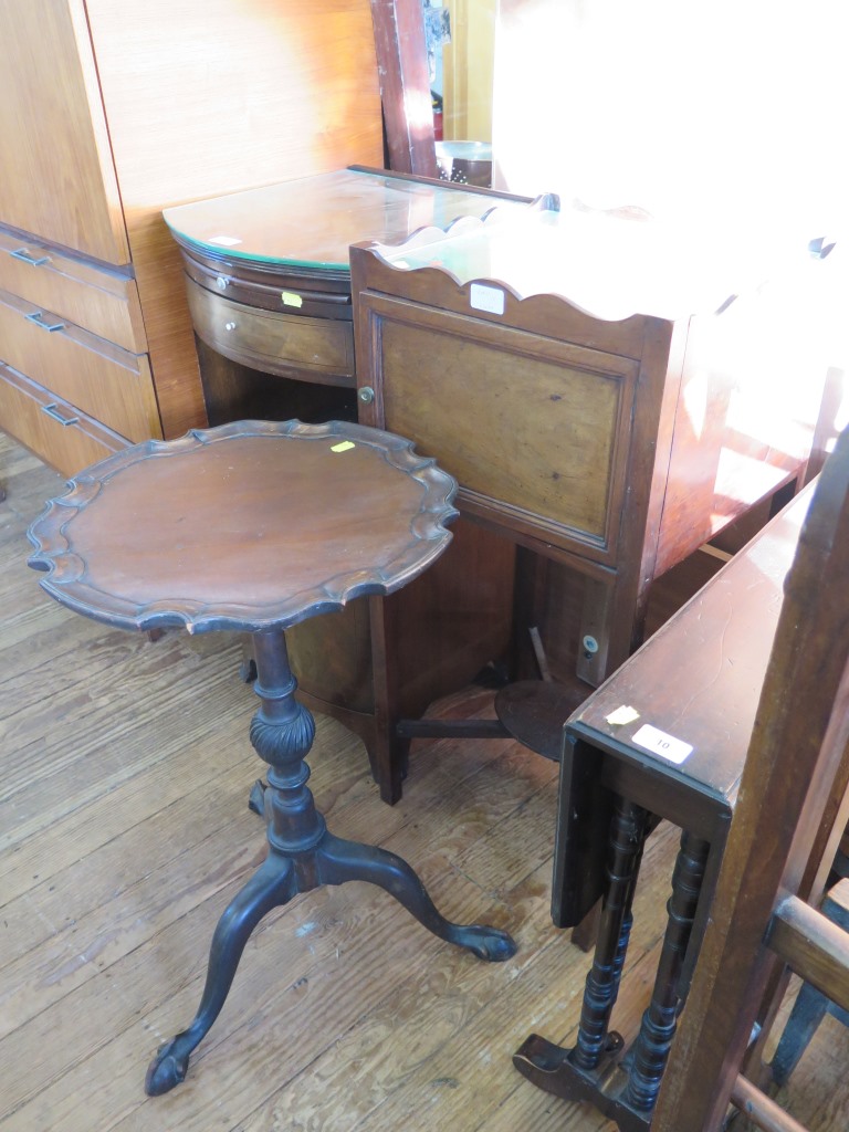 A mahogany bow front bedside cabinet, by Heals of London, 38 cm wide and a 19th century mahogany pot