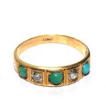 A diamond and turquoise five stone ring, set in 18 carat gold