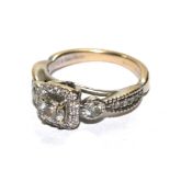 A ladies diamond ring, having old cut diamonds to centre with diamond around and running down both