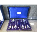 A set of six silver tea spoons and matching sugar tongs in original case