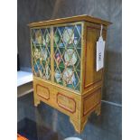 A Huntley and Palmers biscuit tin, in the form of a china cabinet, 18.5 cm high