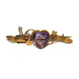 A 9 carat gold bar brooch set with a heart amethyst of good colour